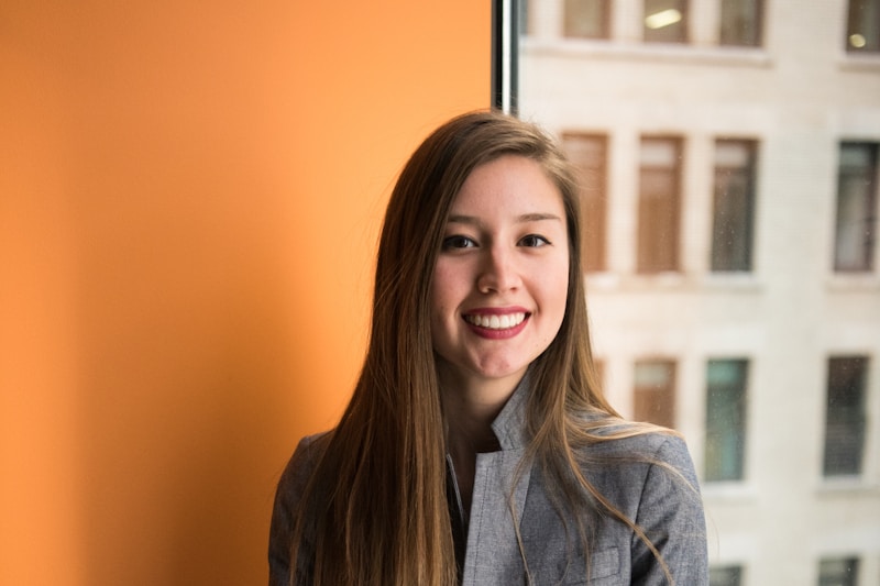 Insurance sales professional smiling in office